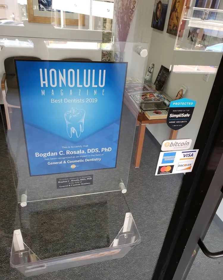 Honolulu Magazine Best Dentists plaque naming Bogdan C. Rosala, DDS, PhD, on display at the practice.